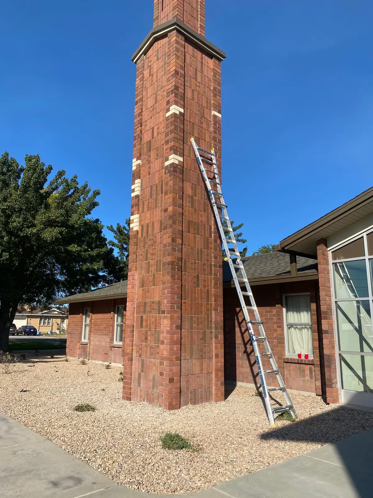 After: modern greige residential brick staining by N&W Enterprises