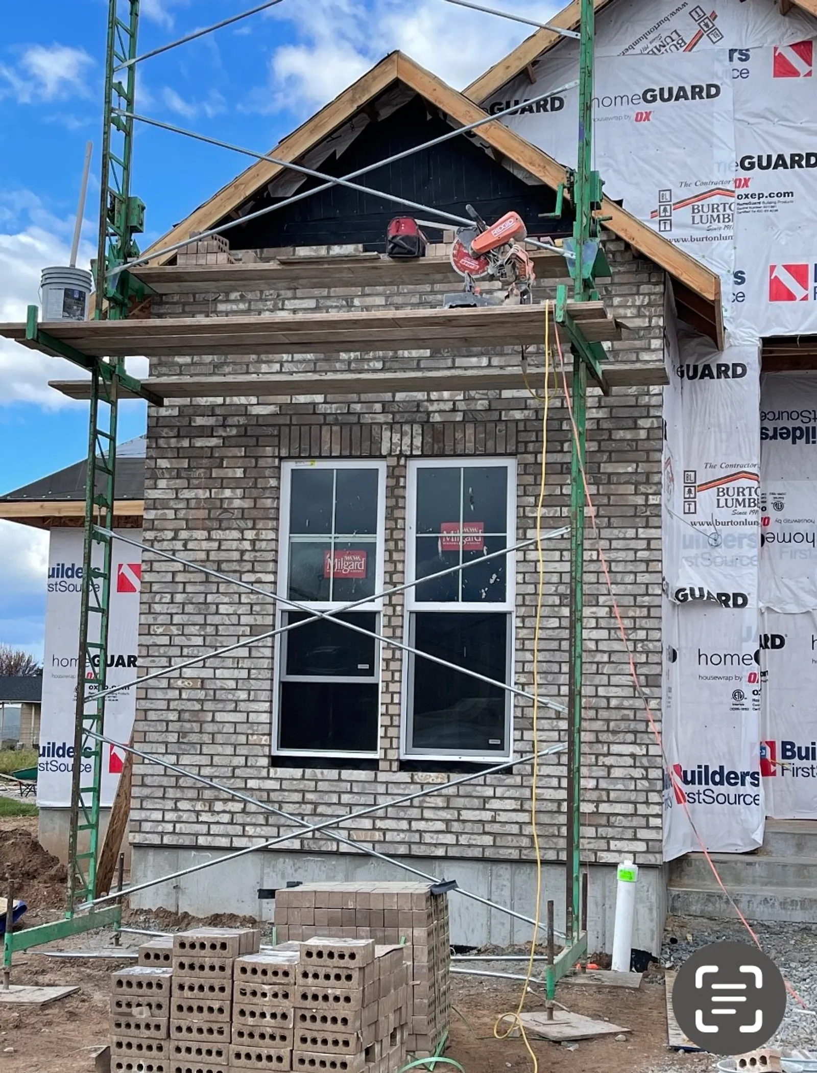 Before: mismatched brick masonry wall after repairs in Utah prior to color correction